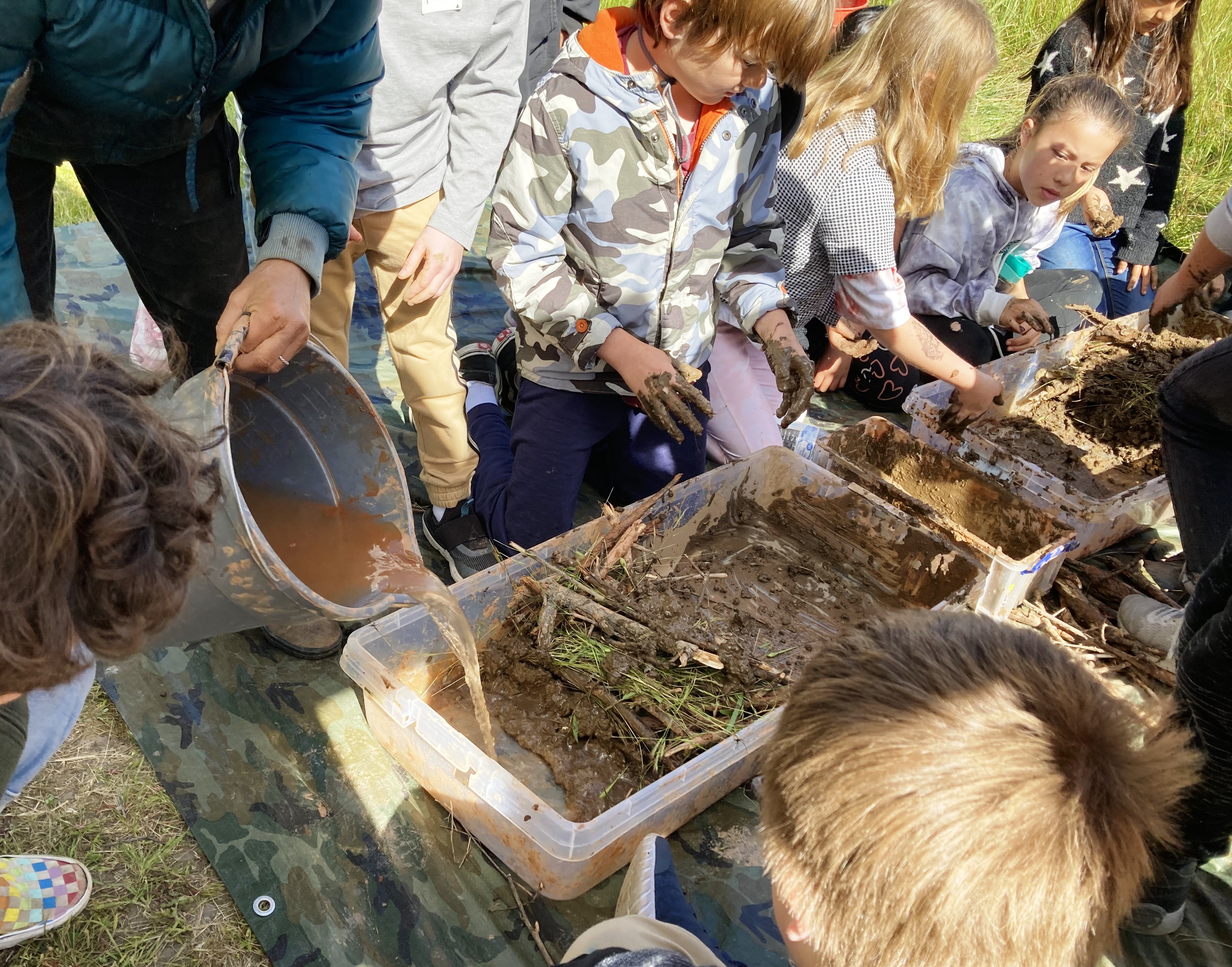 Kids making a beaver dam!